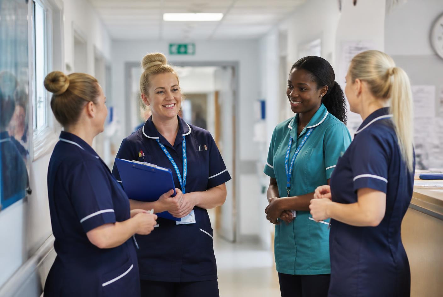 Staffing colleagues discussing a temporary care assignment